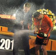 Dario Srna pours champagne Rinat Akhmetov