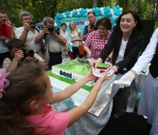 The cake as the soccer field is cut