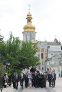 Viktoriya Lesnichaya, Nikolay Azarov and Archbishop Pavel