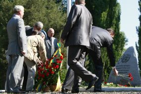 Participants of the ceremony of laying flowers
