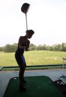 Участница ежегодного международного светского женского гольф-турнир