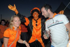 The Dutch fans in a tent camp