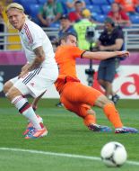 Christian Poulsen and Robin Van Persie