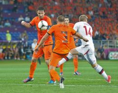 Mark van Bommel, John Heitinga and Lasse Sean