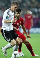 Бастиан Швайнштайгер и Нелсон Оливейра