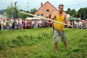 A man squints the grass