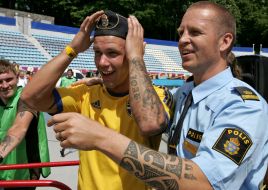 Swedish police and football fan