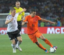 Робин Ван Перси и Бастиан Швайнштайгер