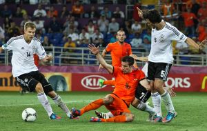 Robin van Persie, Mats Hummels and Holger Badstuber