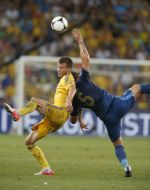 Philippe Mexes and Andriy Yarmolenko