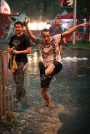 A young man stands in the water