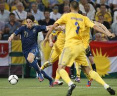 Yevhen Khacheridi and Samir Nasri