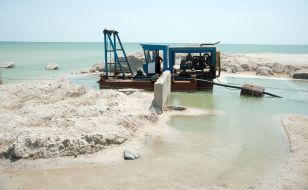 Work on clearing canal of the sand