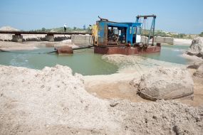 Work on clearing canal of the sand