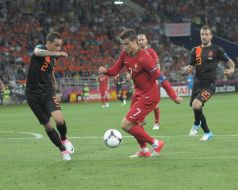 Cristiano Ronaldo, Helder Postiga and Gregory van der Wiel