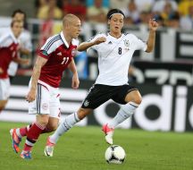 Niki Tsimling and Mesut Ozil