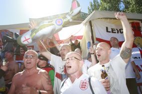England soccer team fans carry the coffin