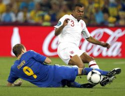 Oleh Gusev and Ashley Cole