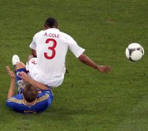 Oleh Gusev and Ashley Cole
