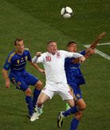 Олег Гусев, Евгений Хачериди и Уэйн Руни