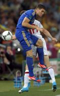 Yevhen Selin and James Milner