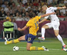 Jonas Olsson and Karim Benzema