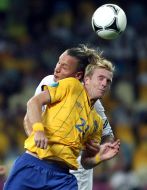 Christian Wilhelmsson and Philippe Mexes