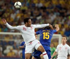 Artem Milevskiy and Joleon Lescott