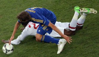 Denys Garmash and Danny Welbeck                                