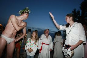 A young man in a chaplet