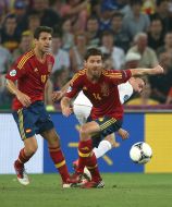 Сеск Фабрегас and Xabi Alonso
