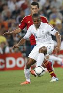 Sergio Busquets and Florent Malouda