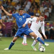 Уэйн Руни и Андреа Барцалли