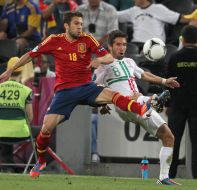 Joao Moutinho and Jordi Alba