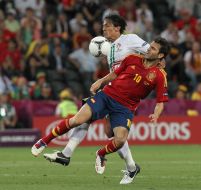 Bruno Alves and Cesc Fabregas
