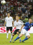 Holger Badstuber and Antonio Cassano