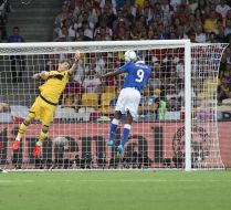 Mario Balotelli and Iker Casillas