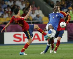 Sergio Busquets and Mario Balotelli