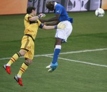 Mario Balotelli and Iker Casillas