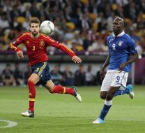 Gerard Pique and Mario Balotelli