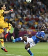 Mario Balotelli and Iker Casillas