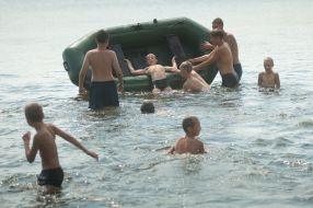 Children bath in the river