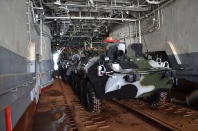 APCs in the hold of the large landing craft