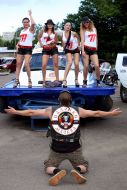 Russian biker on his knees before Ukrainian girls