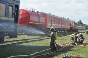 Rescuer extinguishes conditioned fire