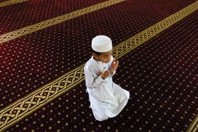 The boy at prayer