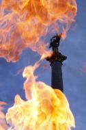 Olympic flame on the background Bereginya