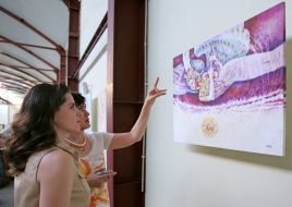 Visitors view a picture