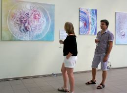 Visitors view a picture