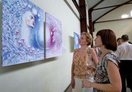 Visitors view a picture